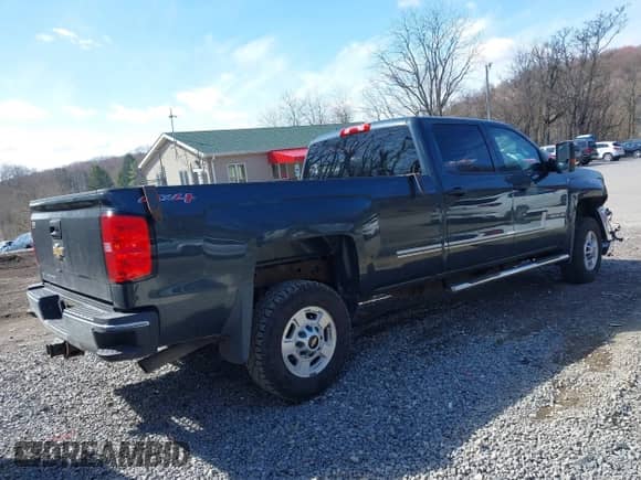 2017 Chevrolet Silverado 2500HD Work Truck z VIN 1GC1KUEG0HF219674, wystawiony jako IAAI lot #41883430 z przebiegiem 94 113 mil mil oraz . Historia ofert i sprzedaży dostępna na DreamBid. Obrazek 4.