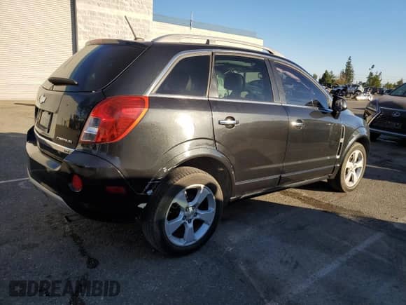2014 Chevrolet Captiva Sport LTZ z VIN 3GNAL4EK6ES569410, wystawiony jako Copart lot #79771094 z przebiegiem 142 157 mil mil oraz Szkoda całkowita • Salvage title. Historia ofert i sprzedaży dostępna na DreamBid. Obrazek 3.