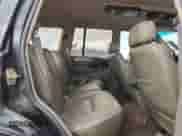 1993 Jeep Grand Cherokee Limited z VIN 1J4GZ78Y5PC544956, wystawiony jako Copart lot #84659285 z przebiegiem 153 945 mil mil oraz Szkoda całkowita • Salvage title. Historia ofert i sprzedaży dostępna na DreamBid. Obrazek 11.