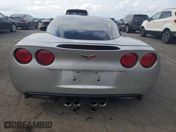 2007 Chevrolet Corvette Z06 с VIN 1G1YY26E975113252, выставлен на аукционе Copart как лот 82185975 с пробегом 36 774 миль миль и Списание • Salvage title. История ставок и продаж доступна на DreamBid. Изображение 6.