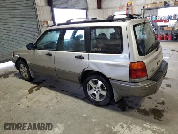 1999 Subaru Forester S with VIN JF1SF6552XG733673, listed as a Copart auction lot 55175035 with 207,847 mi miles and Clean title. Bid and sale history available at DreamBid. Image 2.