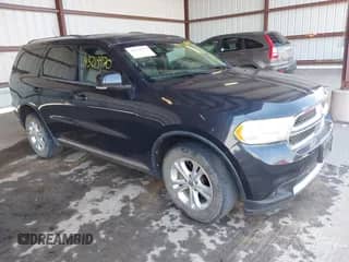 2012 Dodge Durango Crew with VIN 1C4RDJDG0CC300973, listed as a IAAI auction lot 43219970 with 239,016 mi miles and . Bid and sale history available at DreamBid. Image 1.