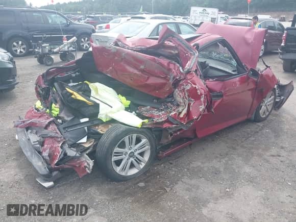 2007 Hyundai Tiburon GS z VIN KMHHM66D47U239778, wystawiony jako IAAI lot #42652083 z przebiegiem 174 508 mil mil oraz . Historia ofert i sprzedaży dostępna na DreamBid. Obrazek 4.