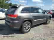 2014 Jeep Grand Cherokee Limited z VIN 1C4RJEBGXEC547813, wystawiony jako Copart lot #81999885 z przebiegiem 120 403 mil mil oraz Szkoda całkowita • Salvage title. Historia ofert i sprzedaży dostępna na DreamBid. Obrazek 3.