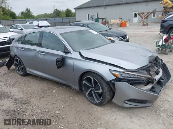 2018 Honda Accord Sport with VIN 1HGCV2E34JA042939, listed as a IAAI auction lot 43154105 with 129,198 mi miles and . Bid and sale history available at DreamBid. Image 1.