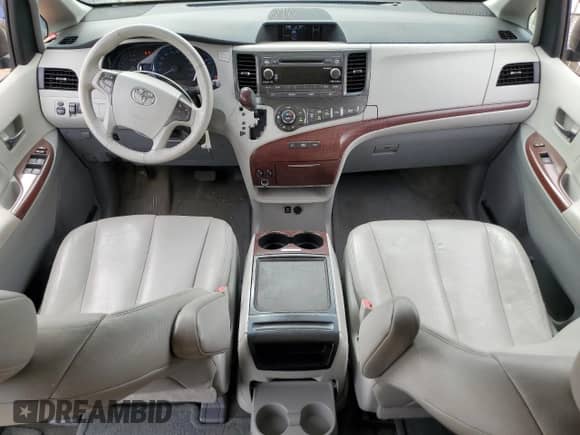 2013 Toyota Sienna XLE AAS with VIN 5TDYK3DC3DS310035, listed as a Copart auction lot 68020445 with 143,125 mi miles and Salvage title. Bid and sale history available at DreamBid. Image 8.