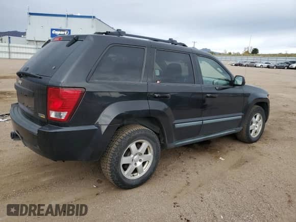 2009 Jeep Grand Cherokee Laredo с VIN 1J8HR48P59C520958, выставлен на аукционе Copart как лот 86542225 с пробегом 199 307 миль миль и Чистый • Clean title. История ставок и продаж доступна на DreamBid. Изображение 3.