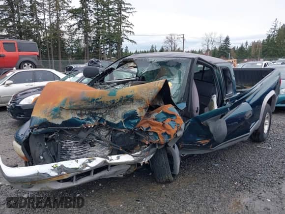 1997 Dodge Dakota z VIN 1B7GG23X9VS242604, wystawiony jako IAAI lot #41772203 z przebiegiem Nie podano mil oraz . Historia ofert i sprzedaży dostępna na DreamBid. Obrazek 6.