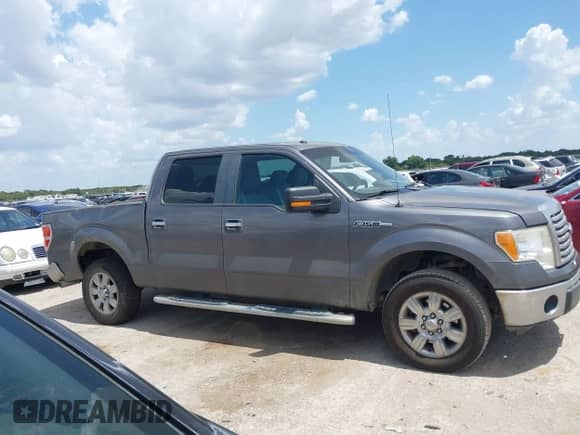 2011 Ford F-150 XL z VIN 1FTFW1CFXBKD37300, wystawiony jako IAAI lot #43023225 z przebiegiem 157 288 mil mil oraz . Historia ofert i sprzedaży dostępna na DreamBid. Obrazek 13.