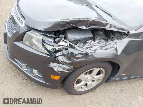 2014 Chevrolet Cruze 1LT with VIN 1G1PC5SB1E7306214, listed as a IAAI auction lot 43287022 with 140,046 mi miles and . Bid and sale history available at DreamBid. Image 6.