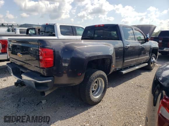 2015 Chevrolet Silverado 3500HD LTZ with VIN 1GC4K0E80FF680420, listed as a Copart auction lot 60500055 with 57,136 mi miles and Salvage title. Bid and sale history available at DreamBid. Image 3.