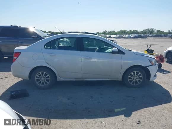 2020 Chevrolet Sonic LT with VIN 1G1JD5SB0L4103610, listed as a IAAI auction lot 42300102 with 46,021 mi miles and . Bid and sale history available at DreamBid. Image 14.