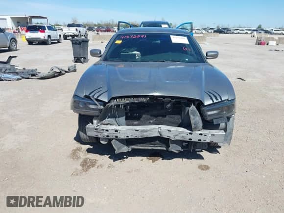 2014 Dodge Charger SE with VIN 2C3CDXBG1EH168709, listed as a IAAI auction lot 41872541 with 137,877 mi miles and . Bid and sale history available at DreamBid. Image 13.