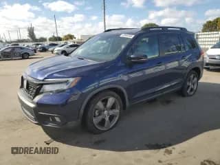 2020 Honda Passport Touring with VIN 5FNYF7H94LB000182, listed as a Copart auction lot 42665365 with 58,051 mi miles and Salvage title. Bid and sale history available at DreamBid. Image 1.