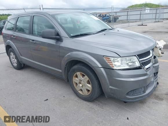 2012 Dodge Journey American Value with VIN 3C4PDCAB8CT206985, listed as a IAAI auction lot 42529224 with 129,359 mi miles and . Bid and sale history available at DreamBid. Image 1.
