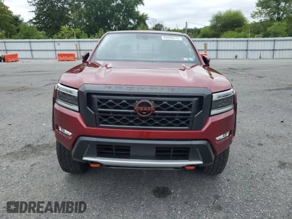 2024 Nissan Frontier Pro-4X with VIN 1N6ED1EK9RN612639, listed as a Copart auction lot 69298615 with 15,552 mi miles and Salvage title. Bid and sale history available at DreamBid. Image 5.