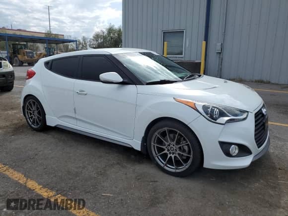 2014 Hyundai Veloster Turbo R-Spec с VIN KMHTC6AE1EU208532, выставлен на аукционе Copart как лот 70159995 с пробегом 75 844 миль миль и Списание • Salvage title. История ставок и продаж доступна на DreamBid. Изображение 4.
