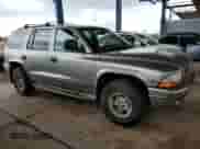 1999 Dodge Durango with VIN 1B4HS28Y8XF627388, listed as a Copart auction lot 71213005 with 266,293 mi miles and Clean title. Bid and sale history available at DreamBid. Image 4.