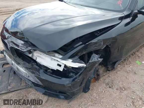 2015 BMW 4 Series 428i with VIN WBA3N3C57FK233259, listed as a IAAI auction lot 41324955 with 82,206 mi miles and . Bid and sale history available at DreamBid. Image 6.