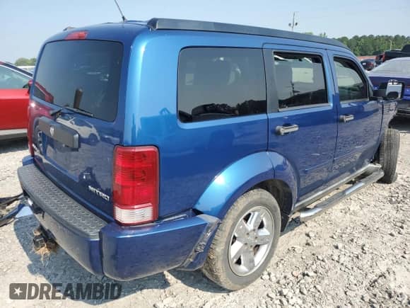 2009 Dodge Nitro SE с VIN 1D8GT28K39W541689, выставлен на аукционе Copart как лот 58440735 с пробегом 217 182 миль миль и Списание • Salvage title. История ставок и продаж доступна на DreamBid. Изображение 3.