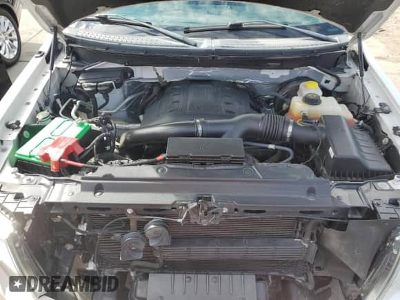 2014 Ford F-150 XLT с VIN 1FTFW1CT1EKE22892, выставлен на аукционе Copart как лот 86332765 с пробегом 14 203 миль миль и Списание • Salvage title. История ставок и продаж доступна на DreamBid. Изображение 11.