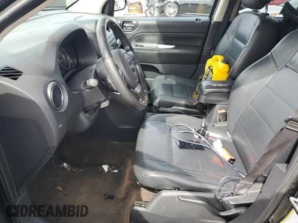 2014 Jeep Compass Latitude with VIN 1C4NJCEB1ED522330, listed as a Copart auction lot 84630415 with 150,480 mi miles and Salvage title. Bid and sale history available at DreamBid. Image 7.