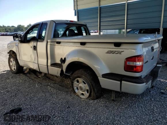 2004 Ford F-150 STX z VIN 1FTRF02WX4KD86718, wystawiony jako Copart lot #67878934 z przebiegiem 216 170 mil mil oraz Szkoda całkowita • Salvage title. Historia ofert i sprzedaży dostępna na DreamBid. Obrazek 2.