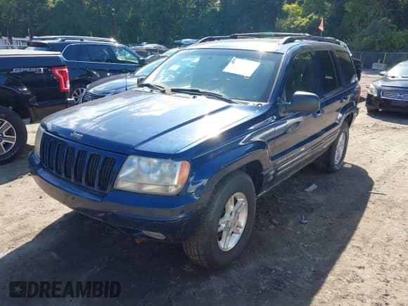 2000 Jeep Grand Cherokee Limited with VIN 1J4GW58N4YC325524, listed as a IAAI auction lot 43245506 with 128,565 mi miles and . Bid and sale history available at DreamBid. Image 2.