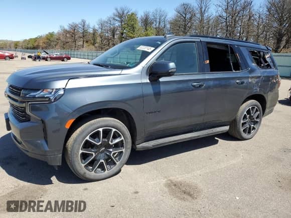 2021 Chevrolet Tahoe RST z VIN 1GNSKRKD3MR220443, wystawiony jako Copart lot #52220145 z przebiegiem 104 727 mil mil oraz Szkoda całkowita • Salvage title. Historia ofert i sprzedaży dostępna na DreamBid. Obrazek 1.
