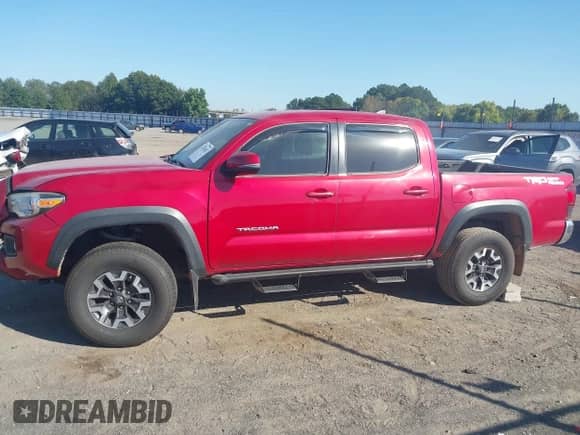 2019 Toyota Tacoma SR5 with VIN 3TMAZ5CNXKM102209, listed as a IAAI auction lot 43392417 with 94,767 mi miles and . Bid and sale history available at DreamBid. Image 14.
