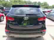 2018 Hyundai Santa Fe 2.4L with VIN 5NMZTDLBXJH057892, listed as a IAAI auction lot 42953917 with 89,397 mi miles and . Bid and sale history available at DreamBid. Image 16.