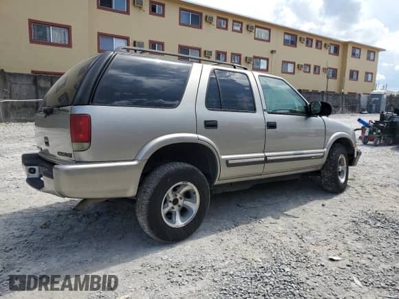 2000 Chevrolet Blazer LS z VIN 1GNCS13W2Y2395156, wystawiony jako Copart lot #65617525 z przebiegiem 140 108 mil mil oraz Szkoda całkowita • Salvage title. Historia ofert i sprzedaży dostępna na DreamBid. Obrazek 3.