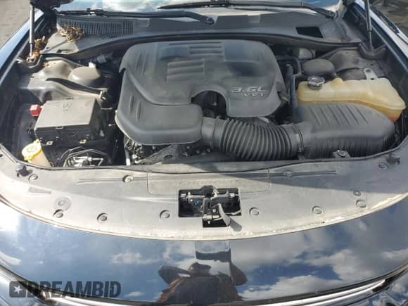 2016 Dodge Charger SE z VIN 2C3CDXFG5GH105223, wystawiony jako Copart lot #81604585 z przebiegiem 92 983 mil mil oraz Szkoda całkowita • Salvage title. Historia ofert i sprzedaży dostępna na DreamBid. Obrazek 11.