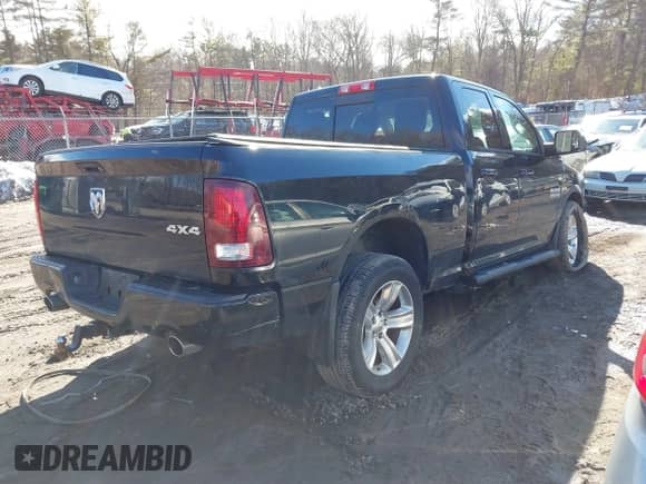 2014 Ram 1500 Sport with VIN 1C6RR7HT6ES124328, listed as a IAAI auction lot 41612784 with 135,585 mi miles and . Bid and sale history available at DreamBid. Image 4.