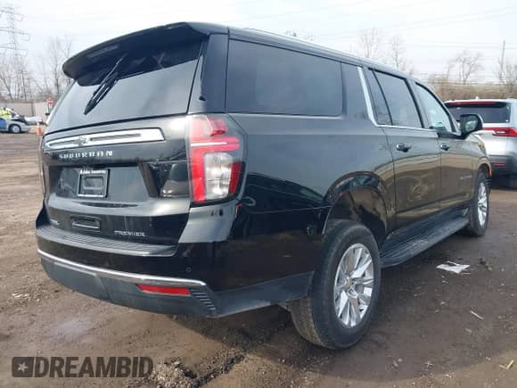 2024 Chevrolet Suburban Premier with VIN 1GNSKFKT7RR352859, listed as a IAAI auction lot 41814407 with 5,234 mi miles and . Bid and sale history available at DreamBid. Image 4.