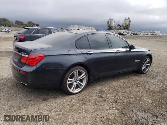 2011 BMW 7 Series 750i with VIN WBAKA8C5XBCY36778, listed as a Copart auction lot 86220094 with 95,536 mi miles and Salvage title. Bid and sale history available at DreamBid. Image 3.