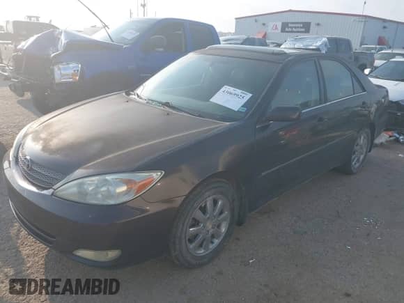 2004 Toyota Camry LE with VIN JTDBF32K440154756, listed as a IAAI auction lot 43069925 with 124,422 mi miles and . Bid and sale history available at DreamBid. Image 17.