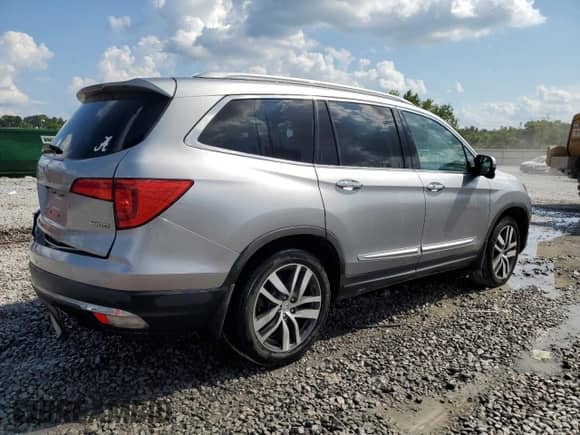 2018 Honda Pilot Touring с VIN 5FNYF5H9XJB000303, выставлен на аукционе Copart как лот 66020165 с пробегом 125 689 миль миль и Списание • Salvage title. История ставок и продаж доступна на DreamBid. Изображение 3.