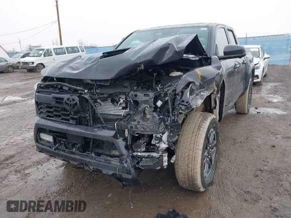 2024 Toyota Tacoma SR5 with VIN 3TMLB5JNXRM055645, listed as a IAAI auction lot 41208771 with 984 mi miles and . Bid and sale history available at DreamBid. Image 6.