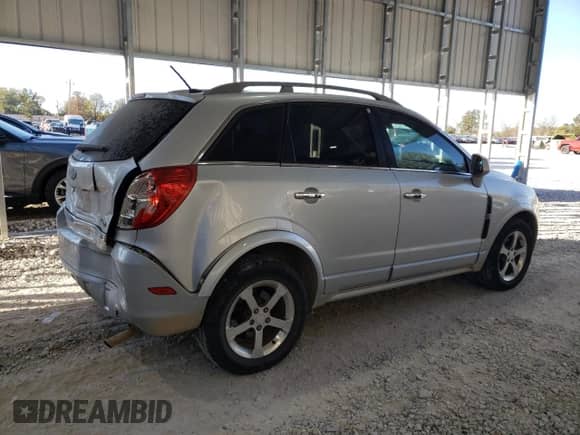 2013 Chevrolet Captiva Sport LT с VIN 3GNAL3EK0DS595932, выставлен на аукционе Copart как лот 75664104 с пробегом 126 077 миль миль и Списание • Salvage title. История ставок и продаж доступна на DreamBid. Изображение 3.