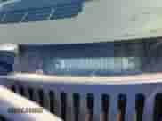 2004 Cadillac Escalade with VIN 1GYEC63TX4R104979, listed as a Copart auction lot 48992455 with 210,937 mi miles and Salvage title. Bid and sale history available at DreamBid. Image 14.