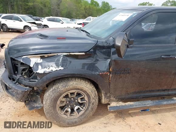 2018 Ram 1500 Rebel with VIN 1C6RR7YT4JS151036, listed as a IAAI auction lot 41988370 with 72,587 mi miles and . Bid and sale history available at DreamBid. Image 6.