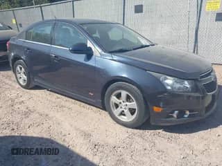 2014 Chevrolet Cruze 1LT with VIN 1G1PC5SB4E7445883, listed as a IAAI auction lot 43361653 with 135,351 mi miles and . Bid and sale history available at DreamBid. Image 1.