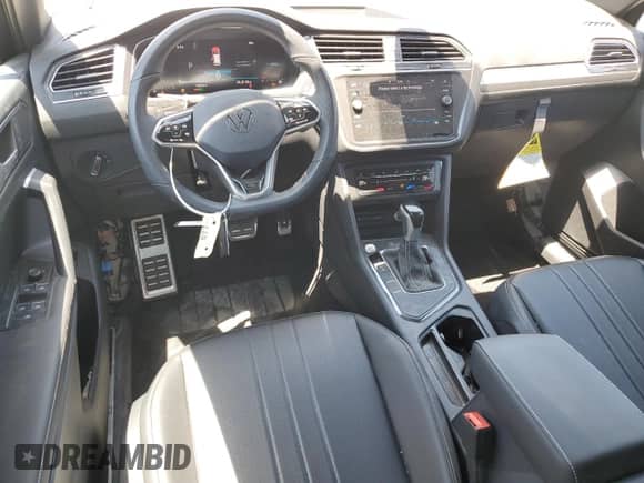 2024 Volkswagen Tiguan SE R-Line Black с VIN 3VVCB7AX7RM129960, выставлен на аукционе Copart как лот 55783365 с пробегом 13 076 миль миль и Списание • Salvage title. История ставок и продаж доступна на DreamBid. Изображение 8.