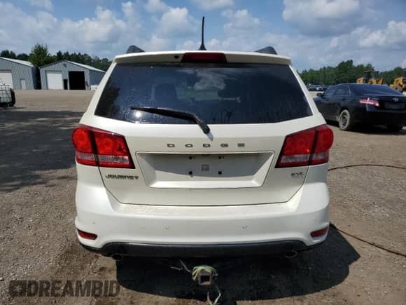 2013 Dodge Journey SXT с VIN 3C4PDCCG0DT650047, выставлен на аукционе Copart как лот 67013775 с пробегом 203 067 миль миль и Списание • Salvage title. История ставок и продаж доступна на DreamBid. Изображение 6.