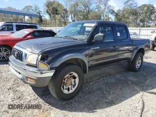 2003 Toyota Tacoma PreRunner z VIN 5TEGM92N73Z202158, wystawiony jako Copart lot #76354094 z przebiegiem 263 521 mil mil oraz Szkoda całkowita • Salvage title. Historia ofert i sprzedaży dostępna na DreamBid. Obrazek 1.