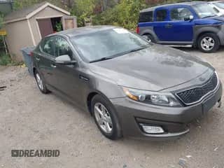2015 Kia Optima LX with VIN 5XXGM4A79FG401947, listed as a IAAI auction lot 43375048 with 96,885 mi miles and . Bid and sale history available at DreamBid. Image 1.