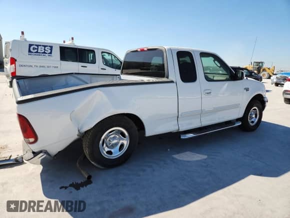 2003 Ford F-150 XL z VIN 2FTRX17L63CB07124, wystawiony jako Copart lot #86682935 z przebiegiem 101 788 mil mil oraz Szkoda całkowita • Salvage title. Historia ofert i sprzedaży dostępna na DreamBid. Obrazek 3.