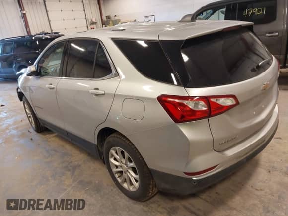 2018 Chevrolet Equinox LT z VIN 2GNAXSEVXJ6352812, wystawiony jako IAAI lot #43168373 z przebiegiem 128 214 mil mil oraz . Historia ofert i sprzedaży dostępna na DreamBid. Obrazek 3.