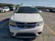 2014 Dodge Journey SXT with VIN 3C4PDCBB7ET119077, listed as a Copart auction lot 68337365 with 99,909 mi miles and Salvage title. Bid and sale history available at DreamBid. Image 5.